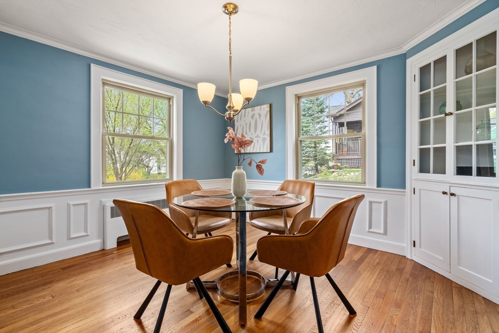 31 Northbourne Road Boston, MA 02130 - Photo 10 of 34 a view of a dining room with furniture window and wooden floor