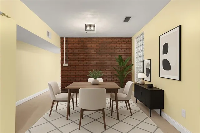 a view of a livingroom with furniture