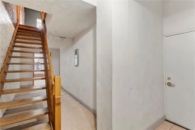 a view of entryway with wooden floor