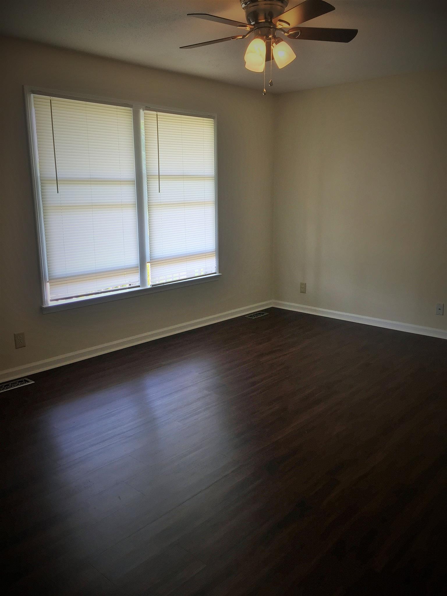 203 Quail Ridge Road Clarksville, TN 37042 - Photo 6 of 30 Spacious living room with new LVT flooring!