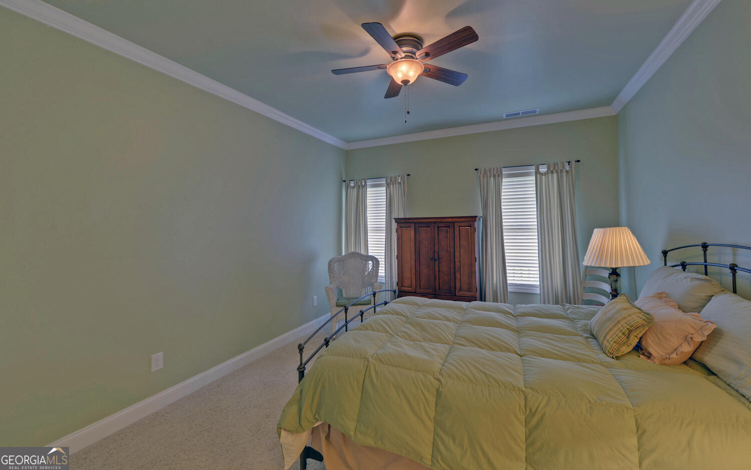 60 Villa Courts Hartwell, GA 30643 - Photo 16 of 47 a bedroom with a bed and a lamp on table