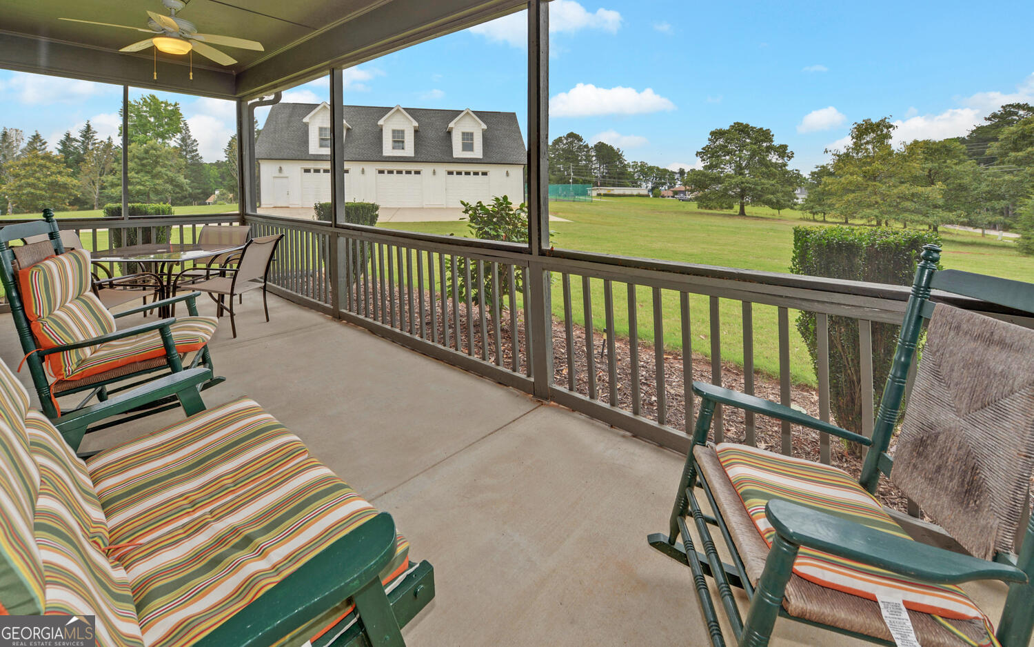 60 Villa Courts Hartwell, GA 30643 - Photo 25 of 47 a view of a chairs and table in patio with a lake view