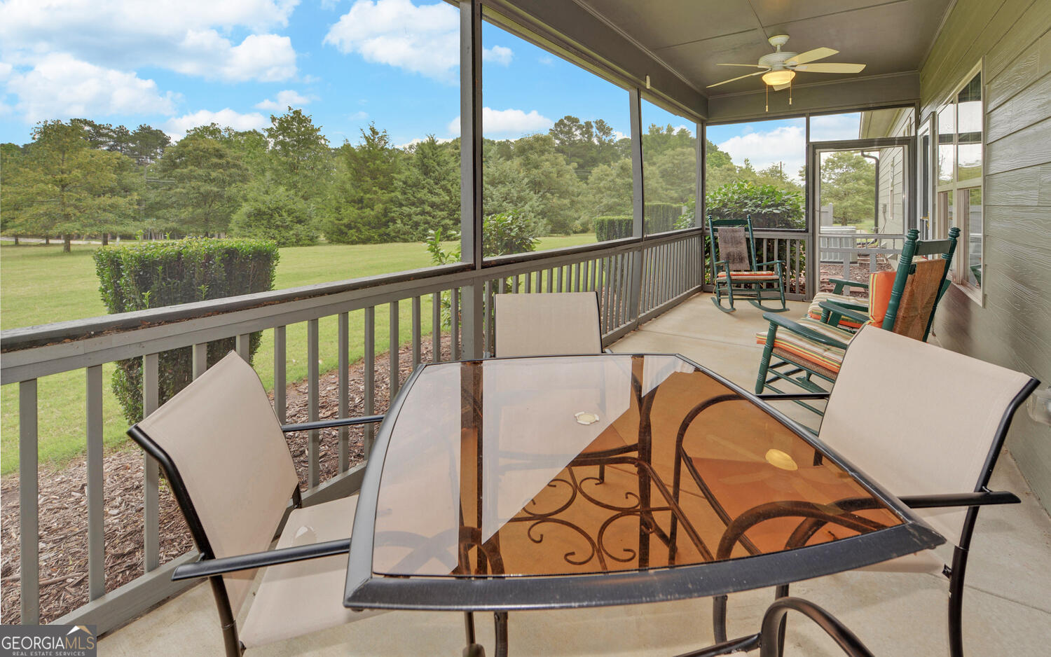 60 Villa Courts Hartwell, GA 30643 - Photo 26 of 47 a view of a balcony with chairs and wooden floor