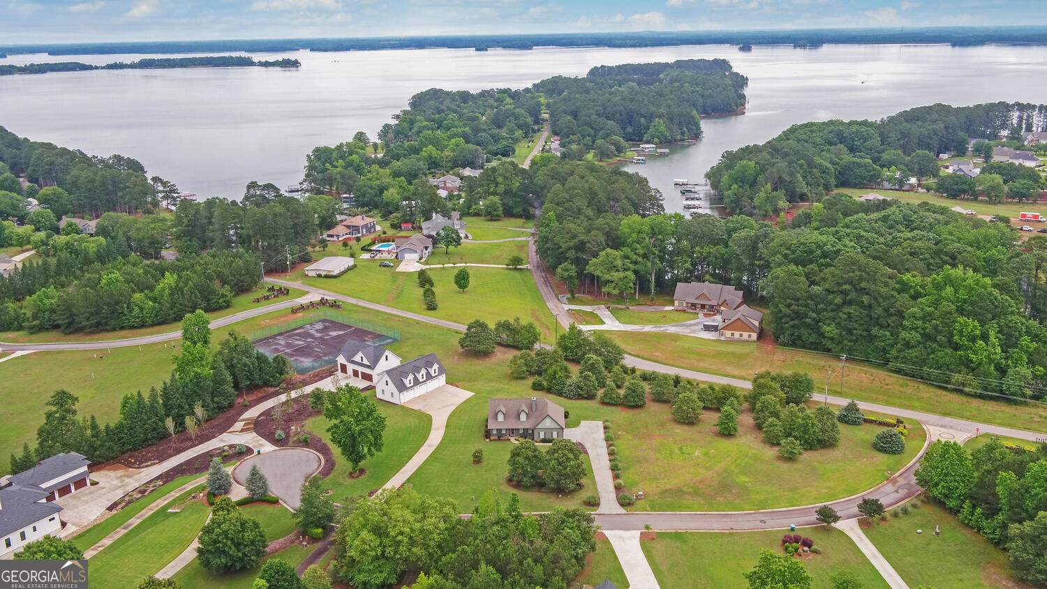 60 Villa Courts Hartwell, GA 30643 - Photo 41 of 47 an aerial view of a house with a garden and lake view