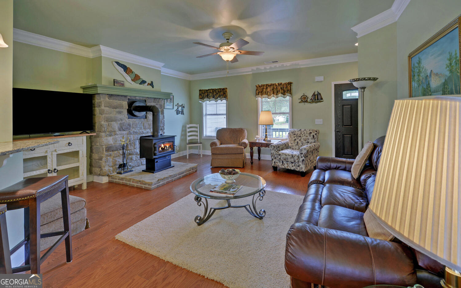 60 Villa Courts Hartwell, GA 30643 - Photo 8 of 47 a living room with fireplace furniture and a flat screen tv