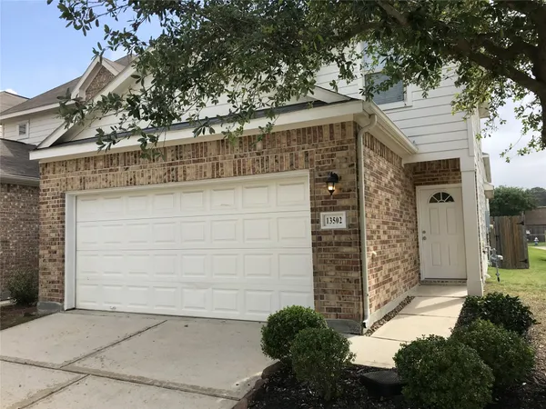 front view of a house with a garage