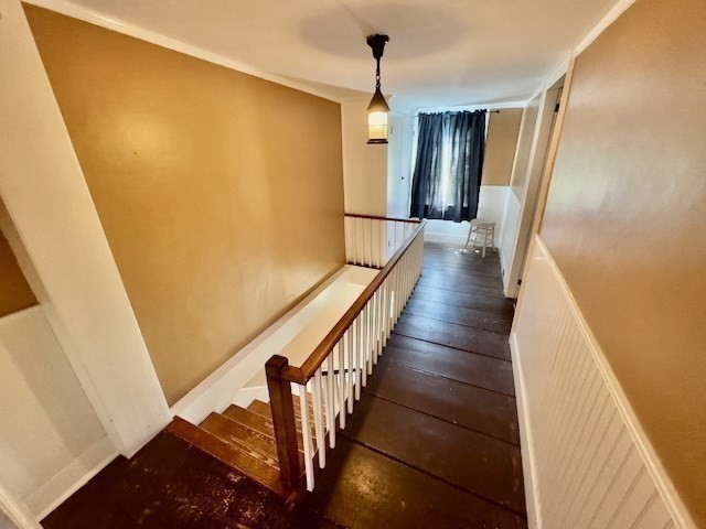 604 Main Road Granville, MA 01034 - Photo 11 of 36 a view of a hallway with wooden floor and staircase