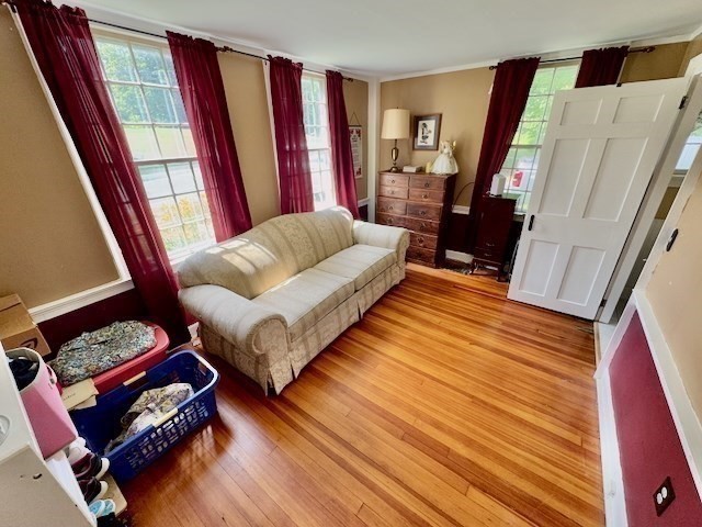 604 Main Road Granville, MA 01034 - Photo 15 of 36 a living room with furniture and a flat screen tv
