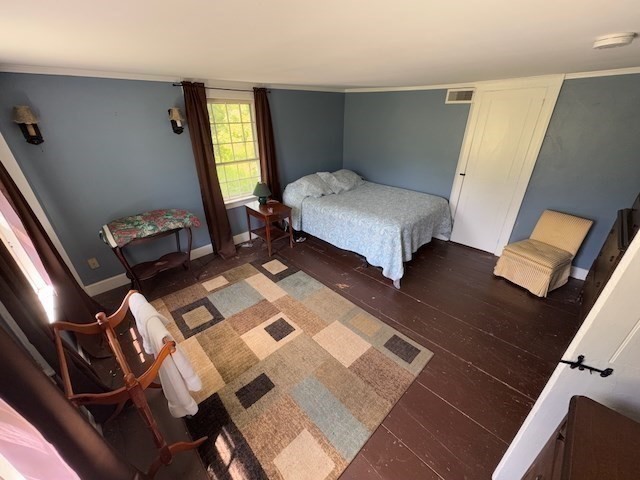 604 Main Road Granville, MA 01034 - Photo 19 of 36 a bedroom with a bed and a mirror