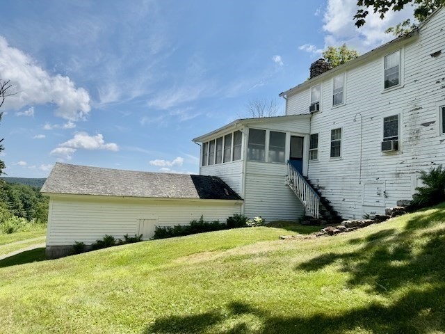 604 Main Road Granville, MA 01034 - Photo 22 of 36 a front view of house with yard
