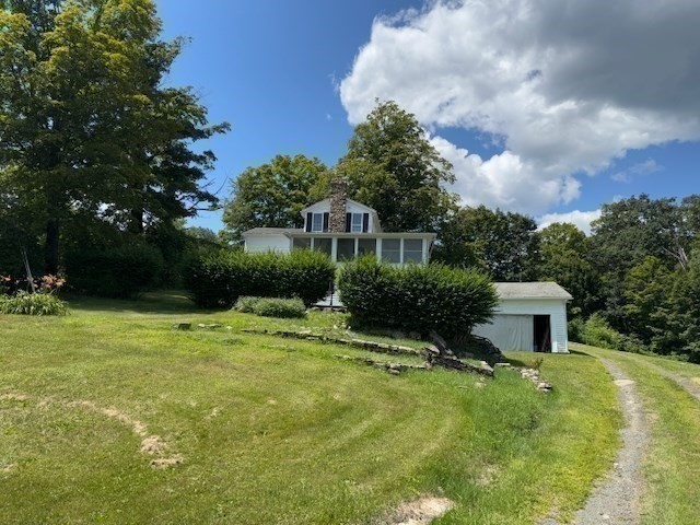 604 Main Road Granville, MA 01034 - Photo 28 of 36 a house view with a garden space