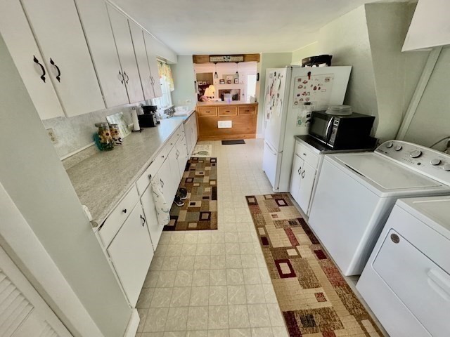 604 Main Road Granville, MA 01034 - Photo 3 of 36 a bed room with a bed and a couch