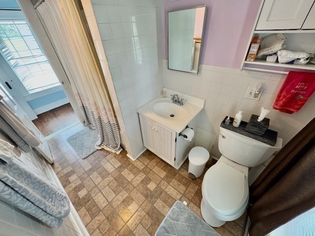 604 Main Road Granville, MA 01034 - Photo 10 of 36 a bathroom with a toilet sink and mirror