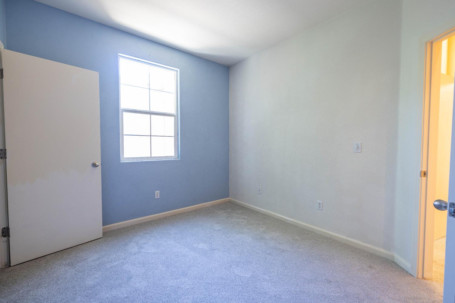 3122 Lea Sterling Way Rancho Cordova, CA 95670 - Photo 21 of 31 an empty room with windows