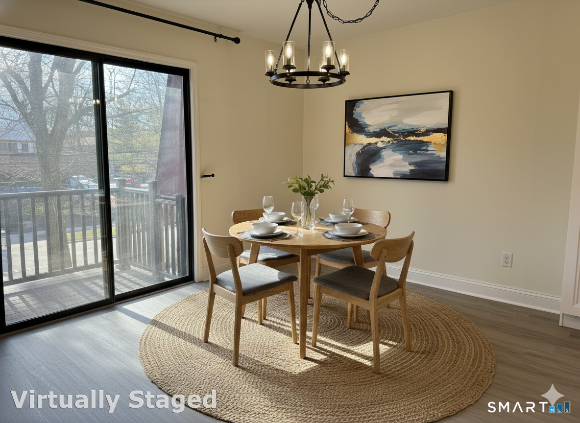 76 Maple Tree Avenue, Unit 6 Stamford, CT 06906 - Photo 11 of 27 a dining room with furniture a chandelier and wooden floor