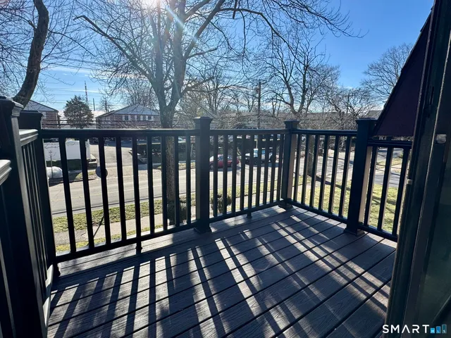 a view of a hallway with a bathroom