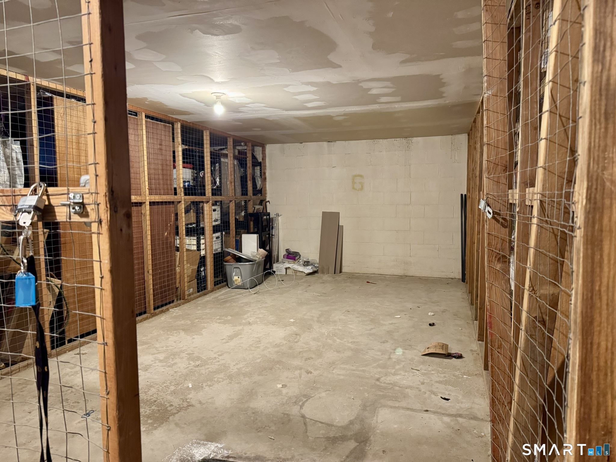76 Maple Tree Avenue, Unit 6 Stamford, CT 06906 - Photo 21 of 27 a view of a hallway with a bathroom