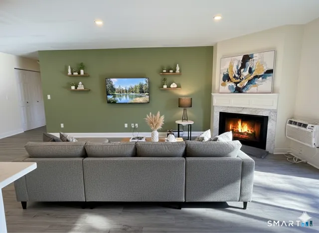 a view of a livingroom with wooden floor