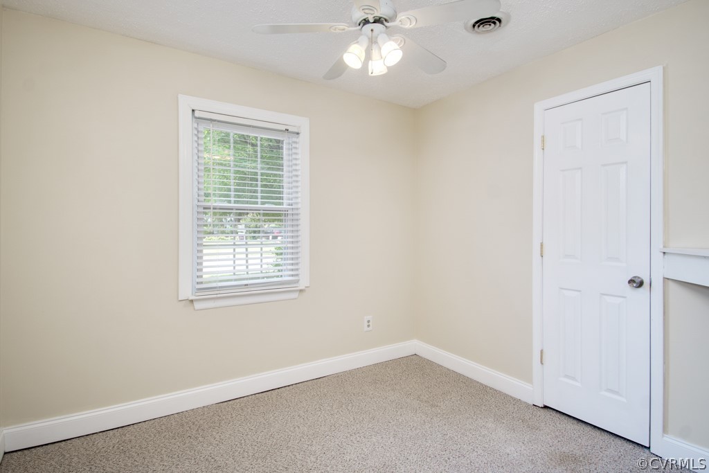 6412 Husting Road Chesterfield, VA 23832 - Photo 18 of 22 an empty room with a window