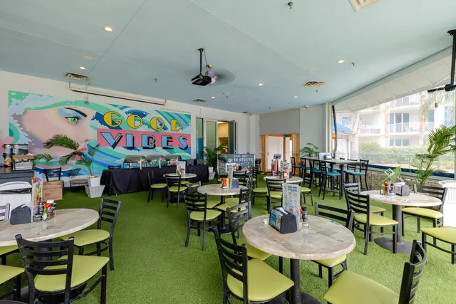 a view of a balcony with chairs