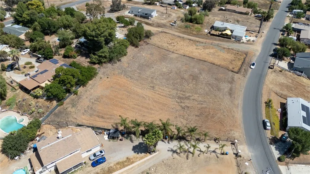 0 Cottontail Drive Menifee, CA 92587 - Photo 5 of 13 an aerial view of a house with a yard and parking spaces