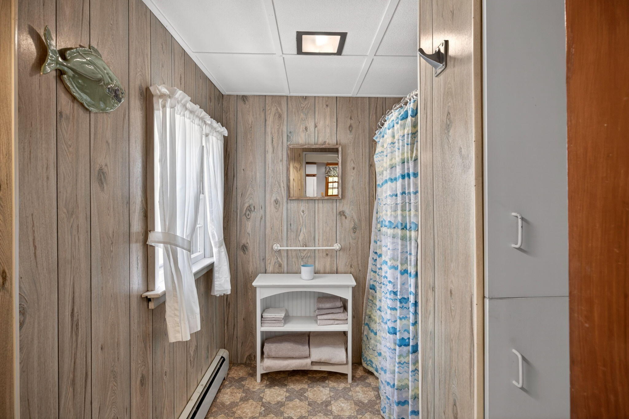 11 Clamshell Lane Mashpee, MA 02649 - Photo 27 of 43 a bathroom with a bathtub and a shower