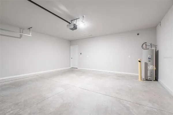 a view of a backyard with potted plants
