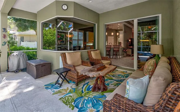 a living room with furniture and a rug