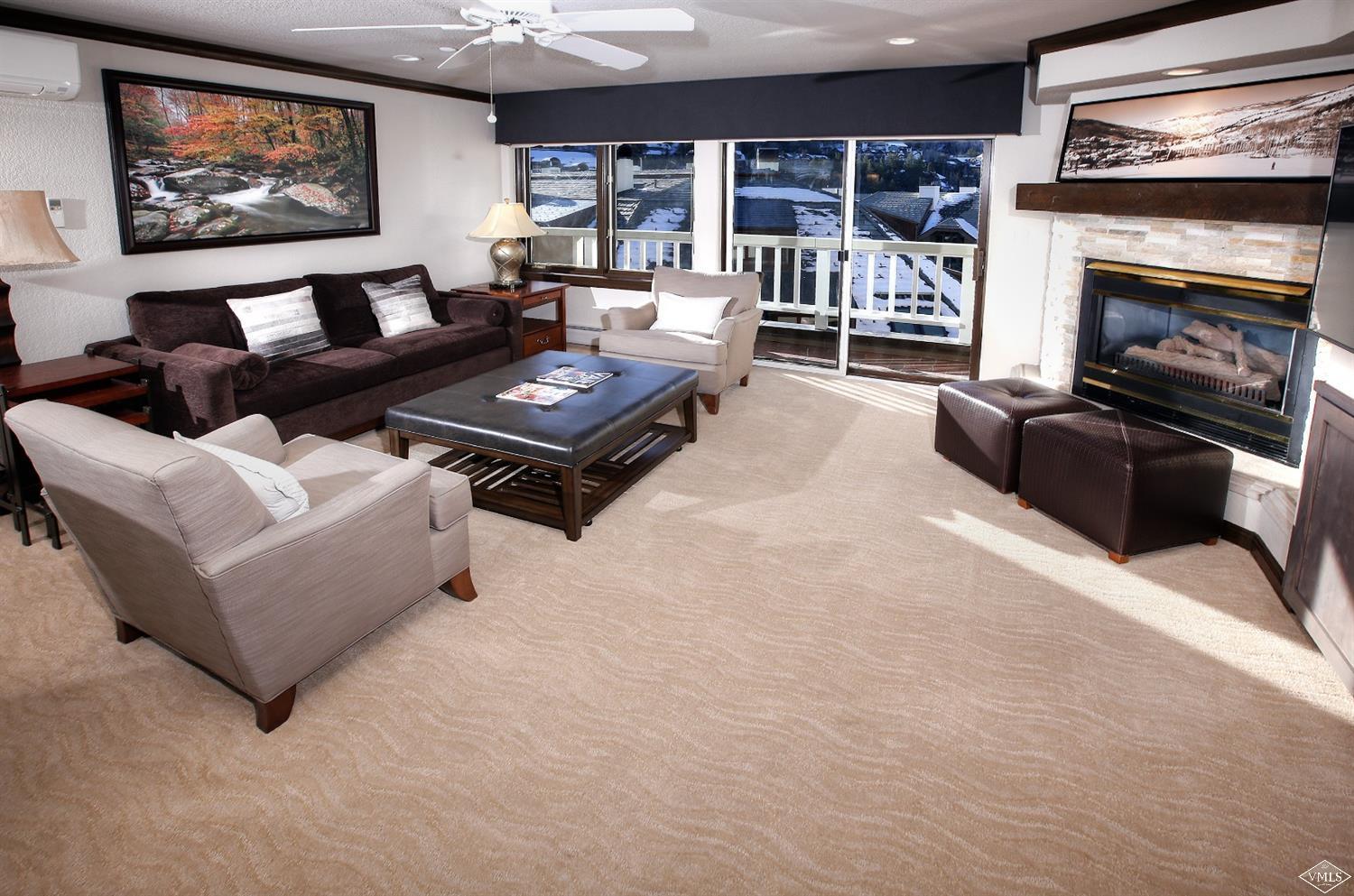 210 Offerson Road, Unit R112/WEEK 33 Beaver Creek, CO 81620 - Photo 2 of 14 a living room with furniture and a fireplace