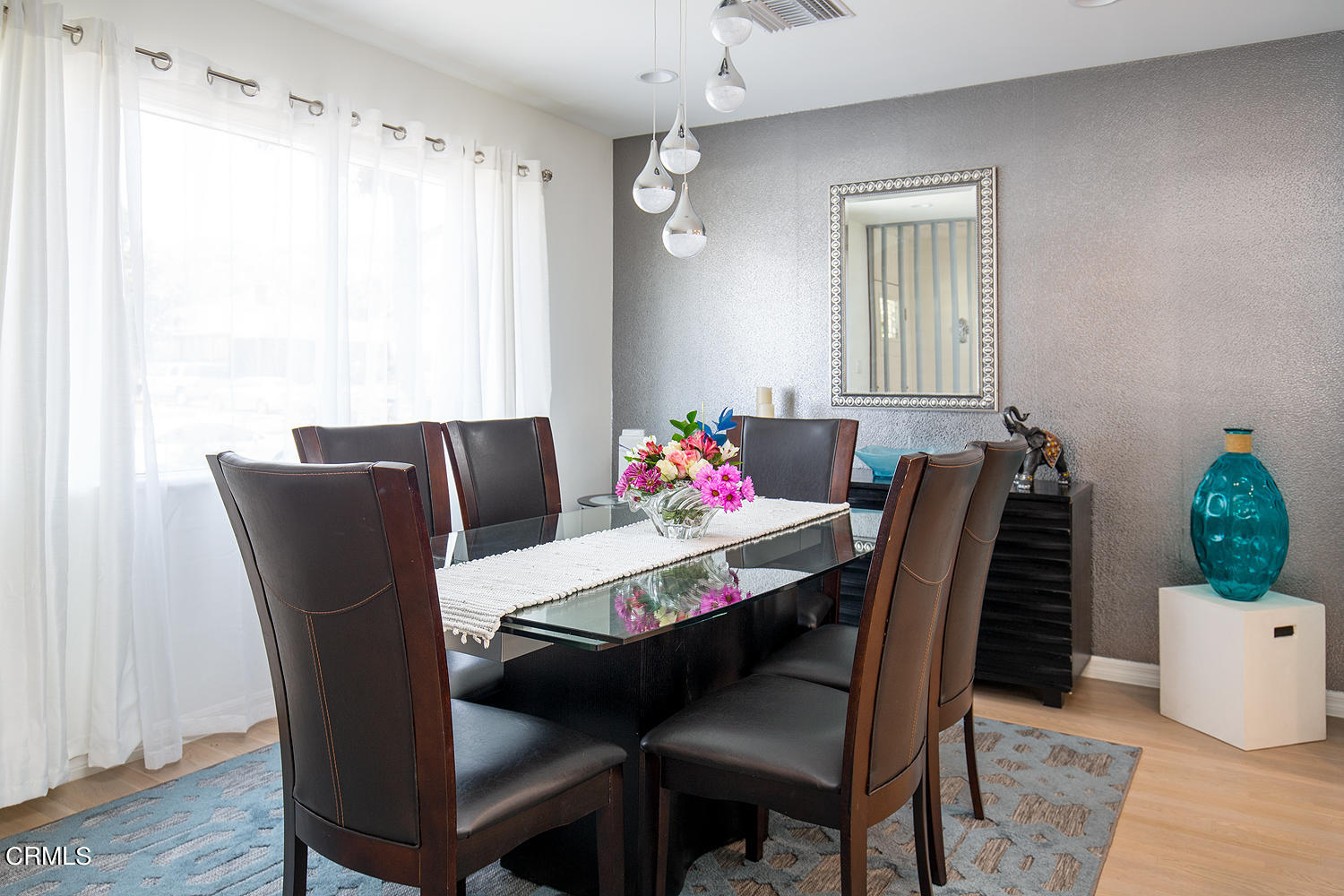 706 Tufts Avenue Burbank, CA 91504 - Photo 12 of 30 a view of a dining room with furniture window and wooden floor