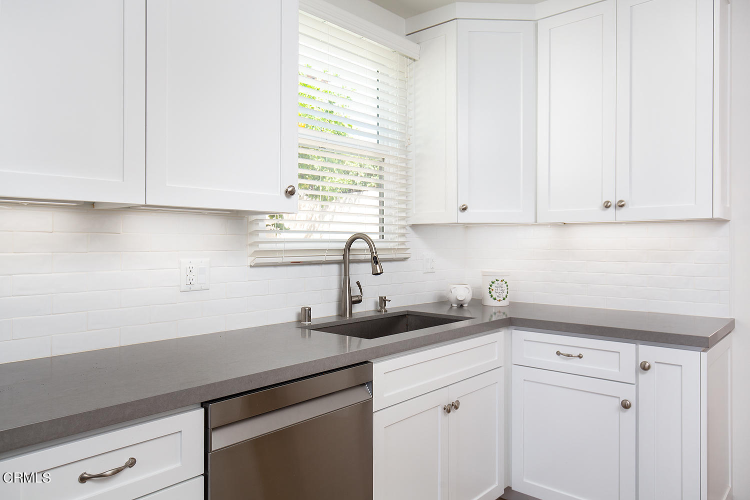 706 Tufts Avenue Burbank, CA 91504 - Photo 15 of 30 a kitchen with a sink cabinets and window