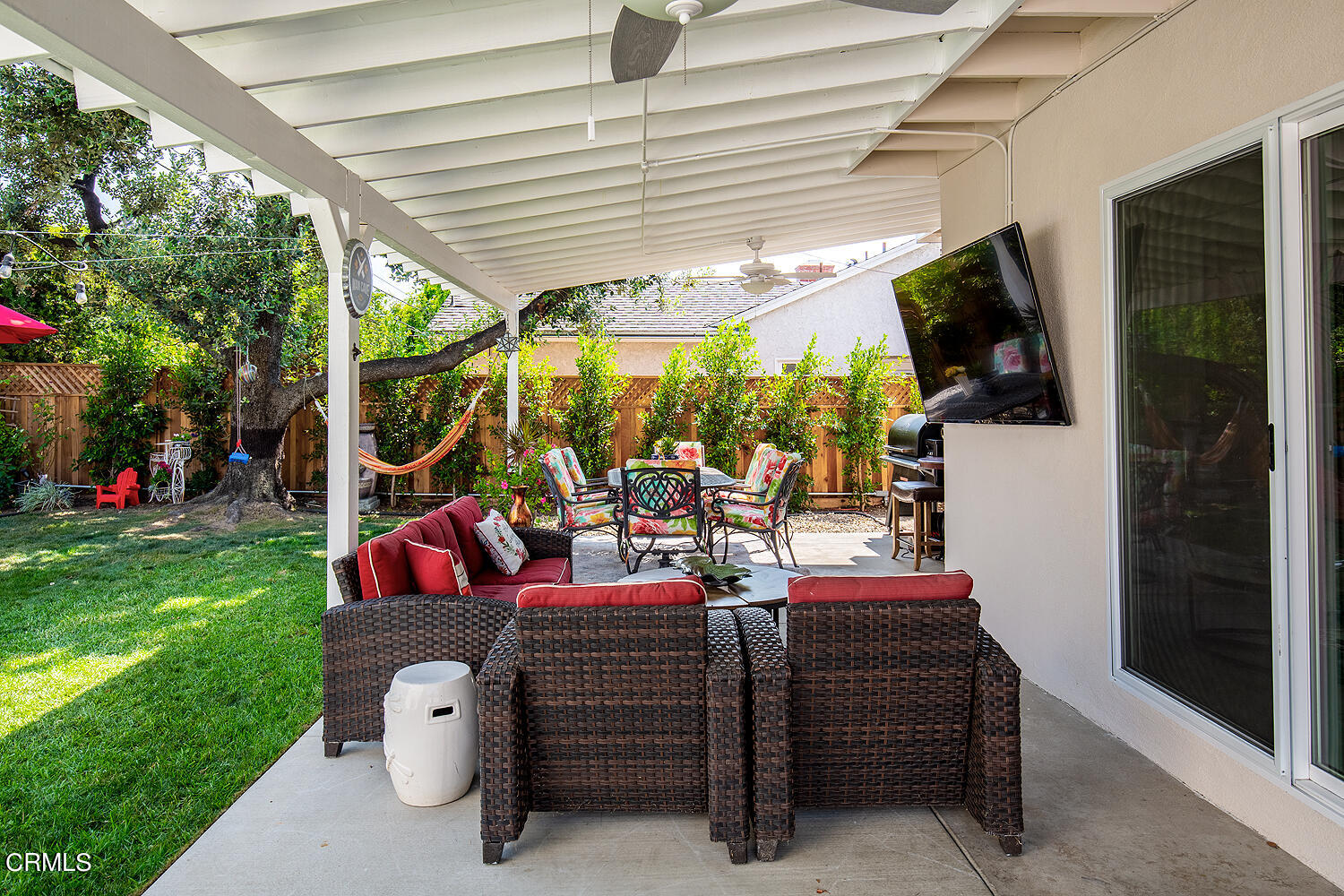 706 Tufts Avenue Burbank, CA 91504 - Photo 25 of 30 a view of a patio with table and chairs potted plants with floor to ceiling window