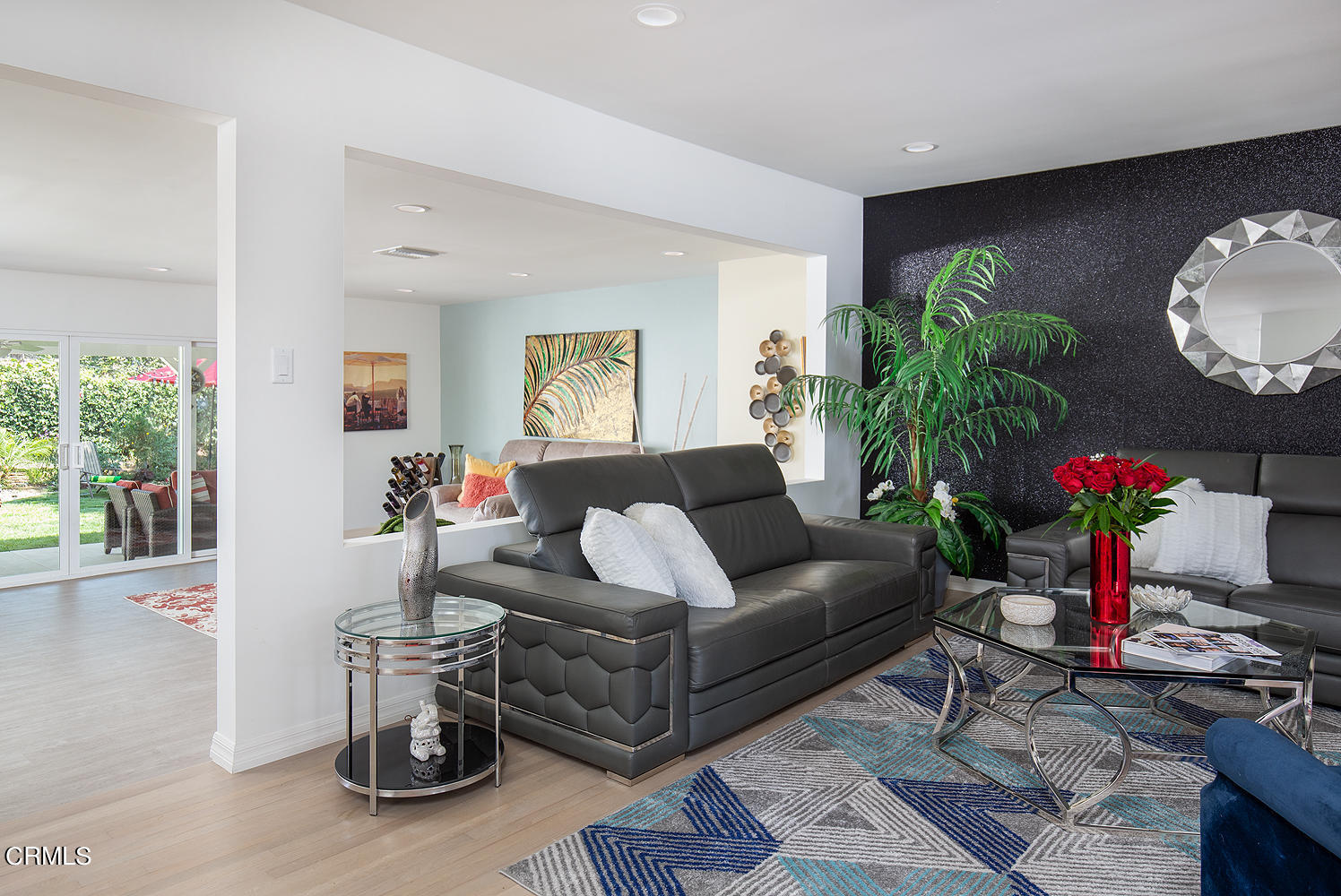 706 Tufts Avenue Burbank, CA 91504 - Photo 8 of 30 a living room with furniture potted plant and a fireplace