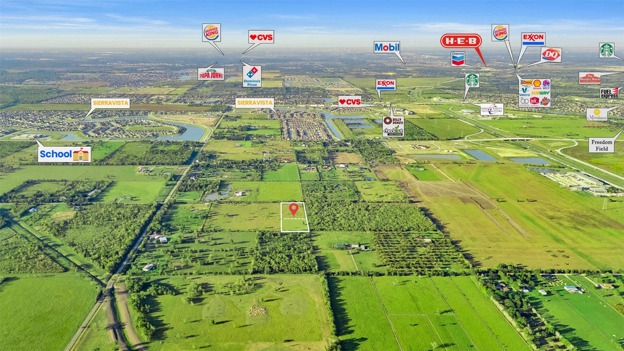 11703 County Road 48 Rosharon, TX 77583 - Photo 2 of 11 a utility room with a washer and dryer