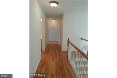 891 Mosby Springs Road Linden, VA 22642 - Photo 12 of 25 Gleaming HW Floors in Upper Level Hallway