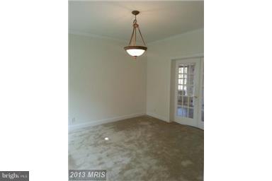 891 Mosby Springs Road Linden, VA 22642 - Photo 8 of 25 Dining Room with French Doors and Crown Molding