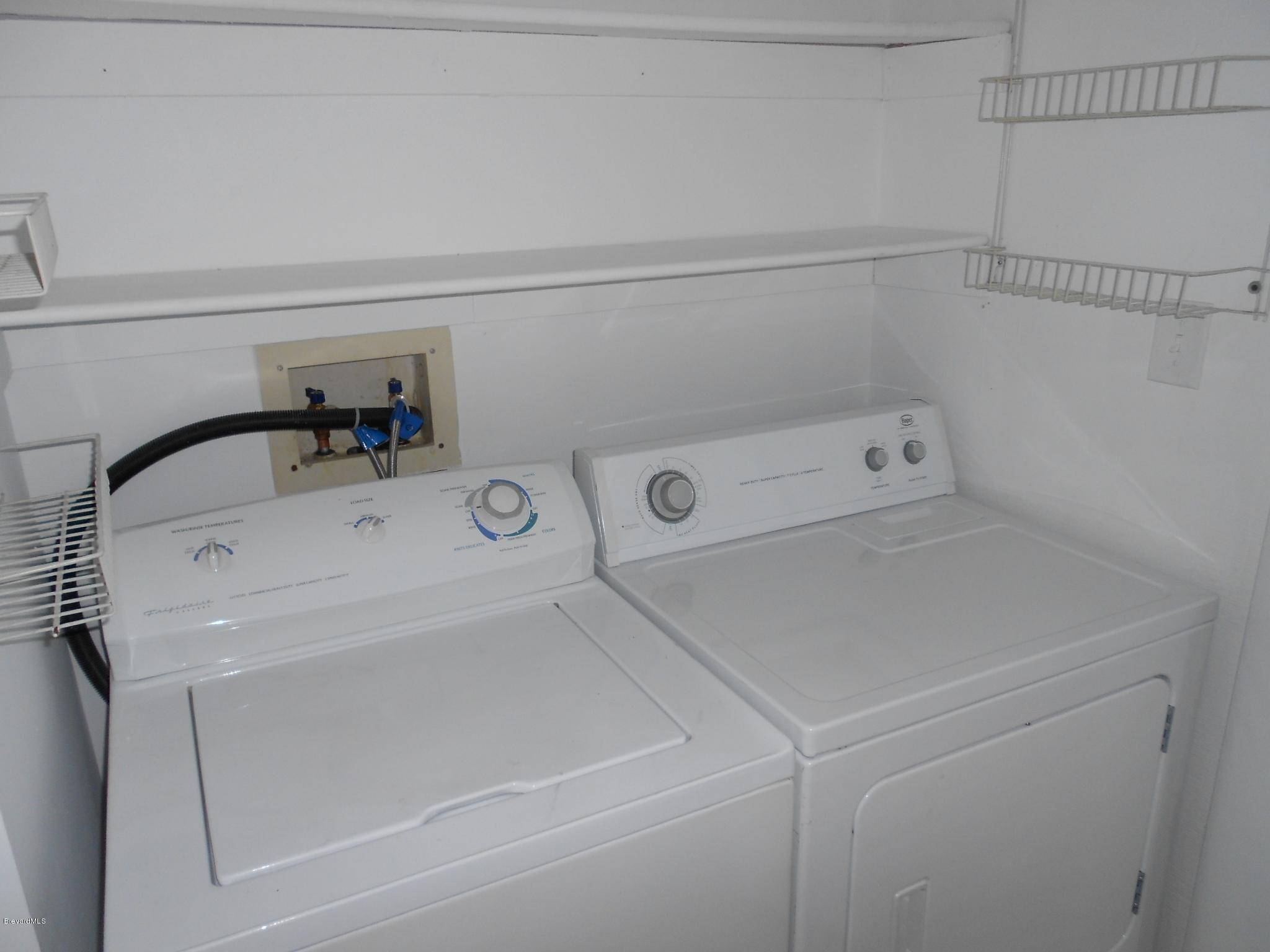 400 Catalina Road, Unit 203 Cocoa Beach, FL 32931 - Photo 4 of 10 a close view of a sink and tap