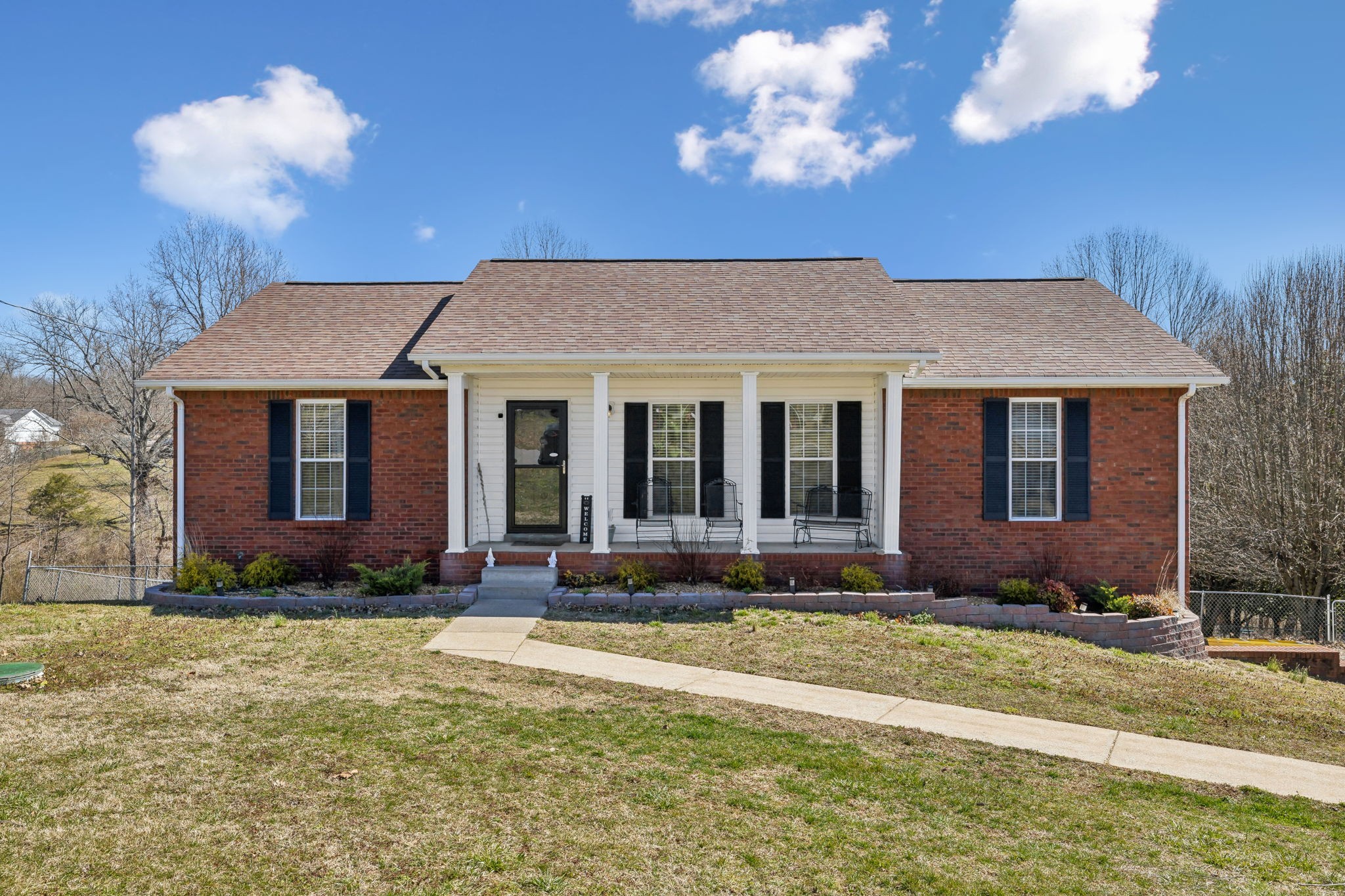 819 Blakemore Road Dickson, TN 37055 - Photo 1 of 54 a front view of a house with a yard