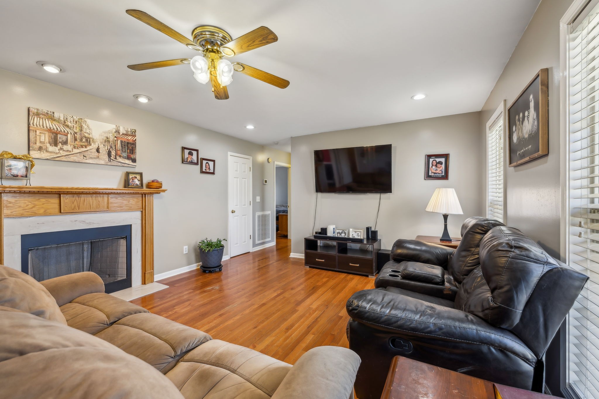 819 Blakemore Road Dickson, TN 37055 - Photo 12 of 54 a living room with furniture and a fireplace
