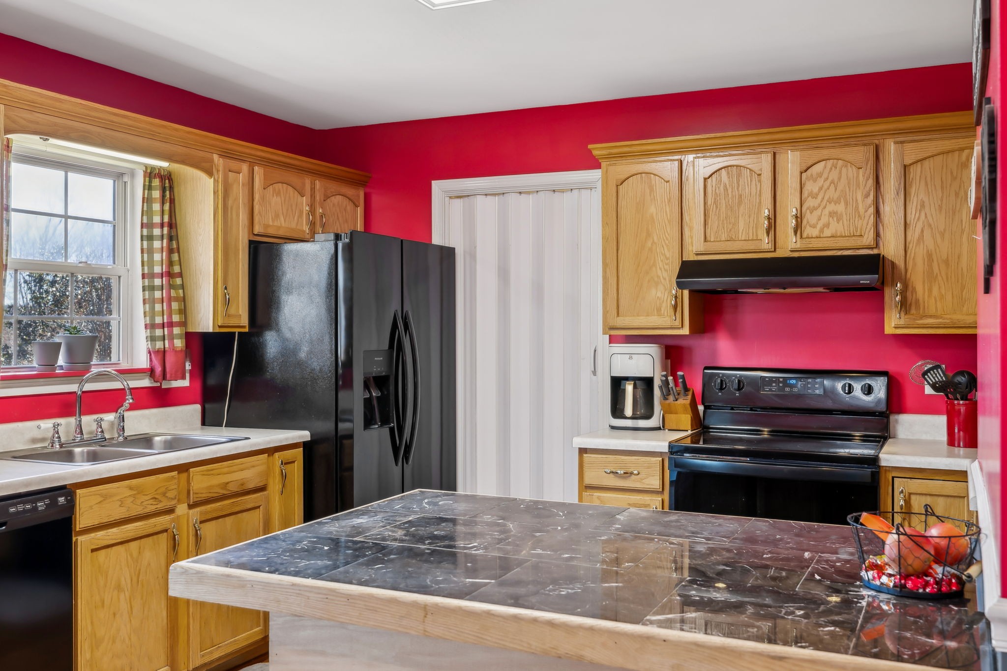 819 Blakemore Road Dickson, TN 37055 - Photo 13 of 54 a kitchen with stainless steel appliances granite countertop a refrigerator and a stove top oven
