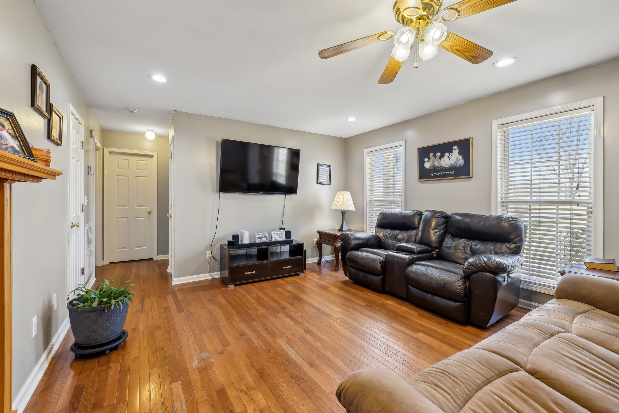 819 Blakemore Road Dickson, TN 37055 - Photo 14 of 54 a living room with furniture and a flat screen tv