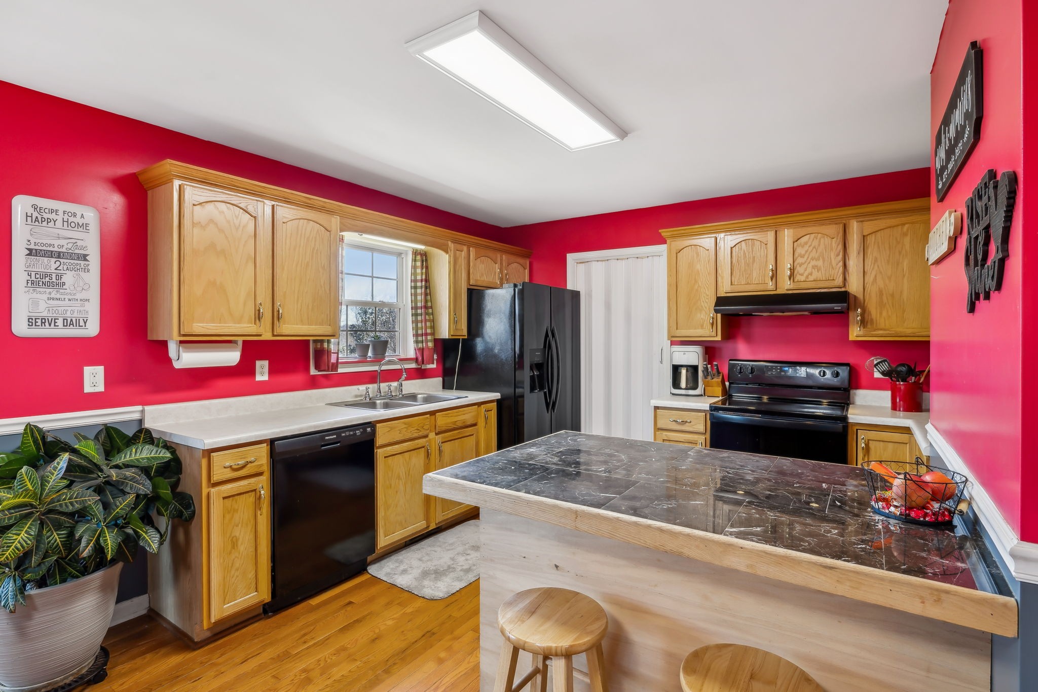 819 Blakemore Road Dickson, TN 37055 - Photo 15 of 54 a kitchen with stainless steel appliances granite countertop a kitchen island a stove and a refrigerator