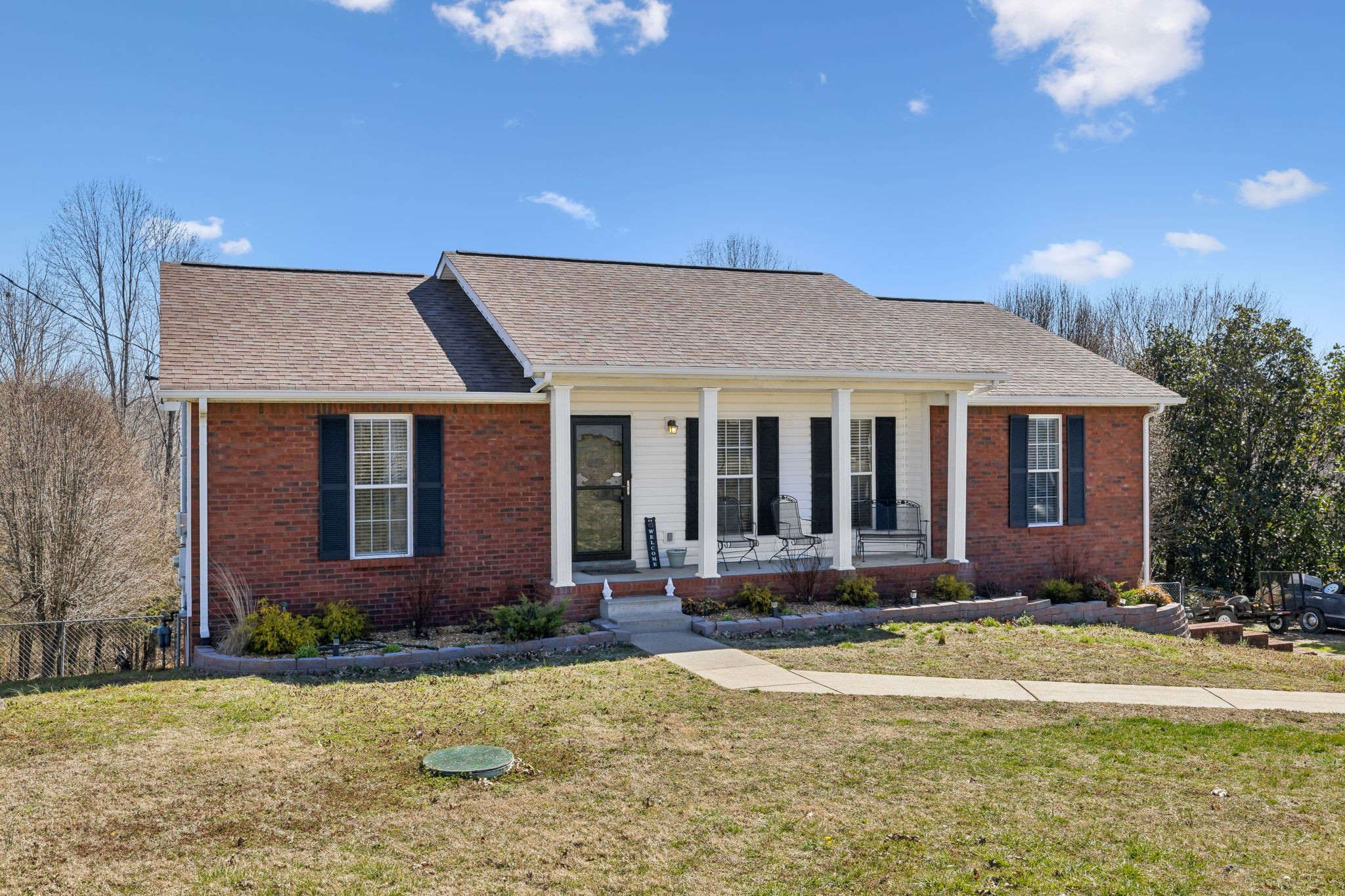 819 Blakemore Road Dickson, TN 37055 - Photo 2 of 54 a front view of a house with a yard