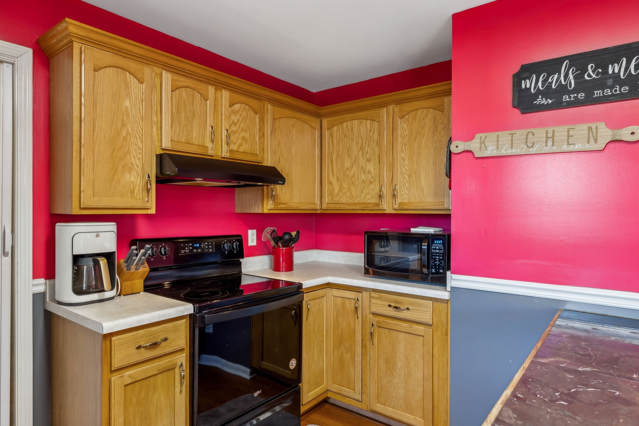 819 Blakemore Road Dickson, TN 37055 - Photo 21 of 54 a kitchen with stainless steel appliances granite countertop a stove and cabinets
