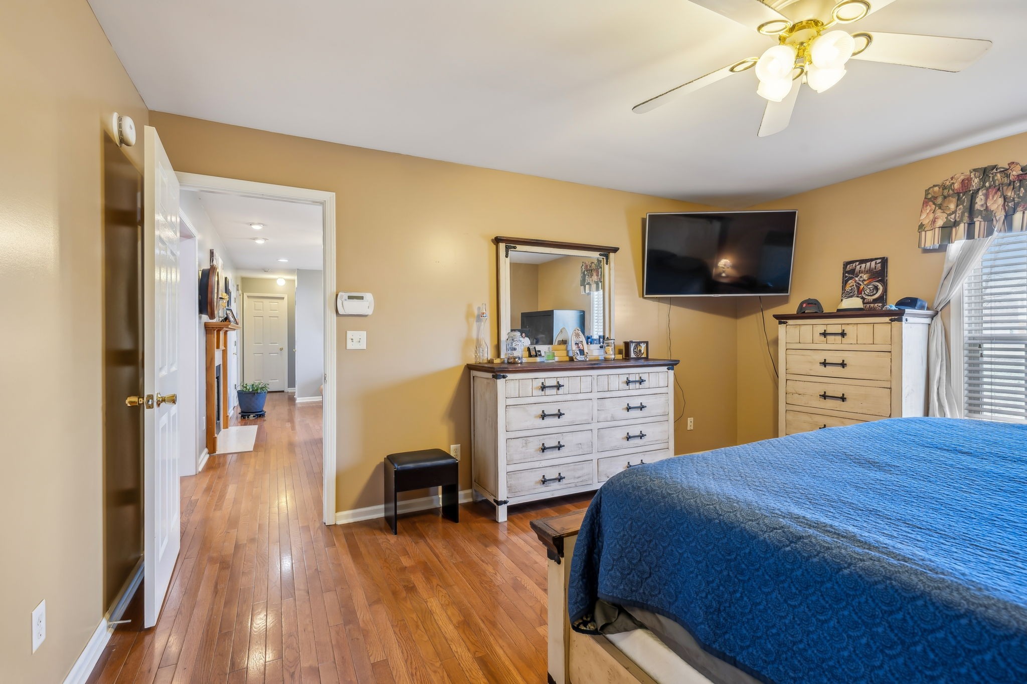 819 Blakemore Road Dickson, TN 37055 - Photo 25 of 54 a bedroom with a bed and furniture