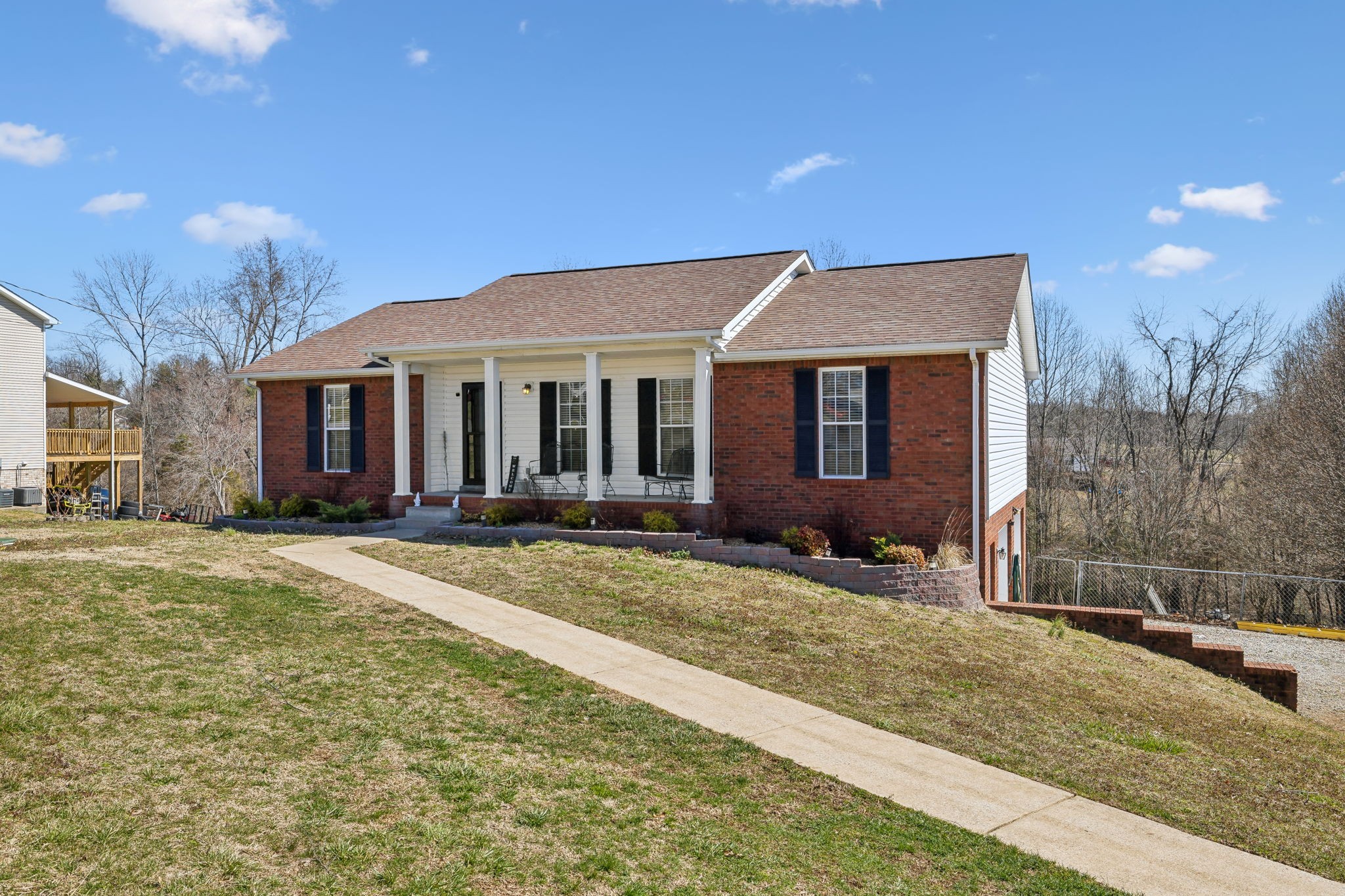 819 Blakemore Road Dickson, TN 37055 - Photo 3 of 54 a front view of a house with a yard