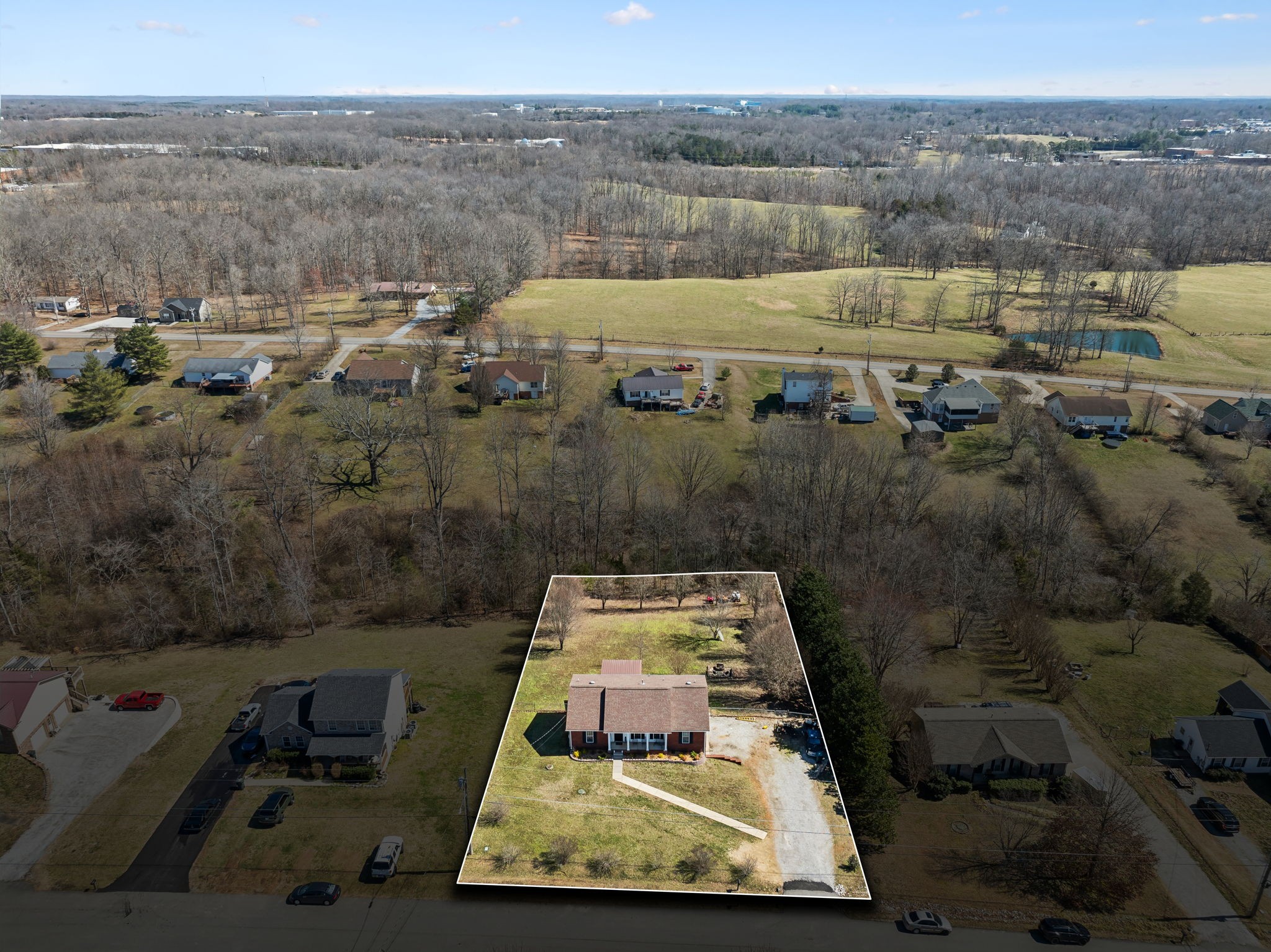 819 Blakemore Road Dickson, TN 37055 - Photo 46 of 54 an aerial view of a house with a yard