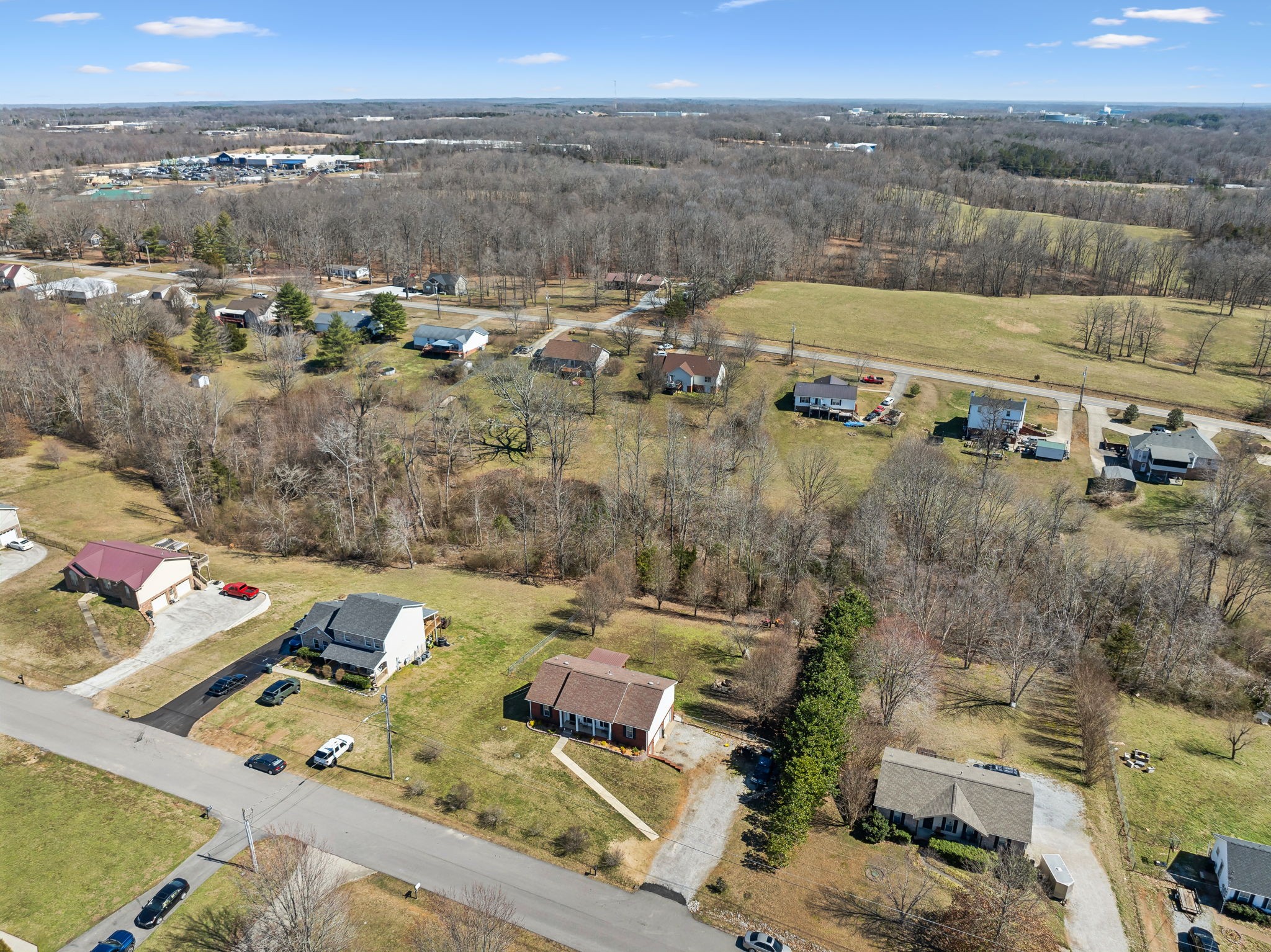819 Blakemore Road Dickson, TN 37055 - Photo 48 of 54 an aerial view of a house with a yard
