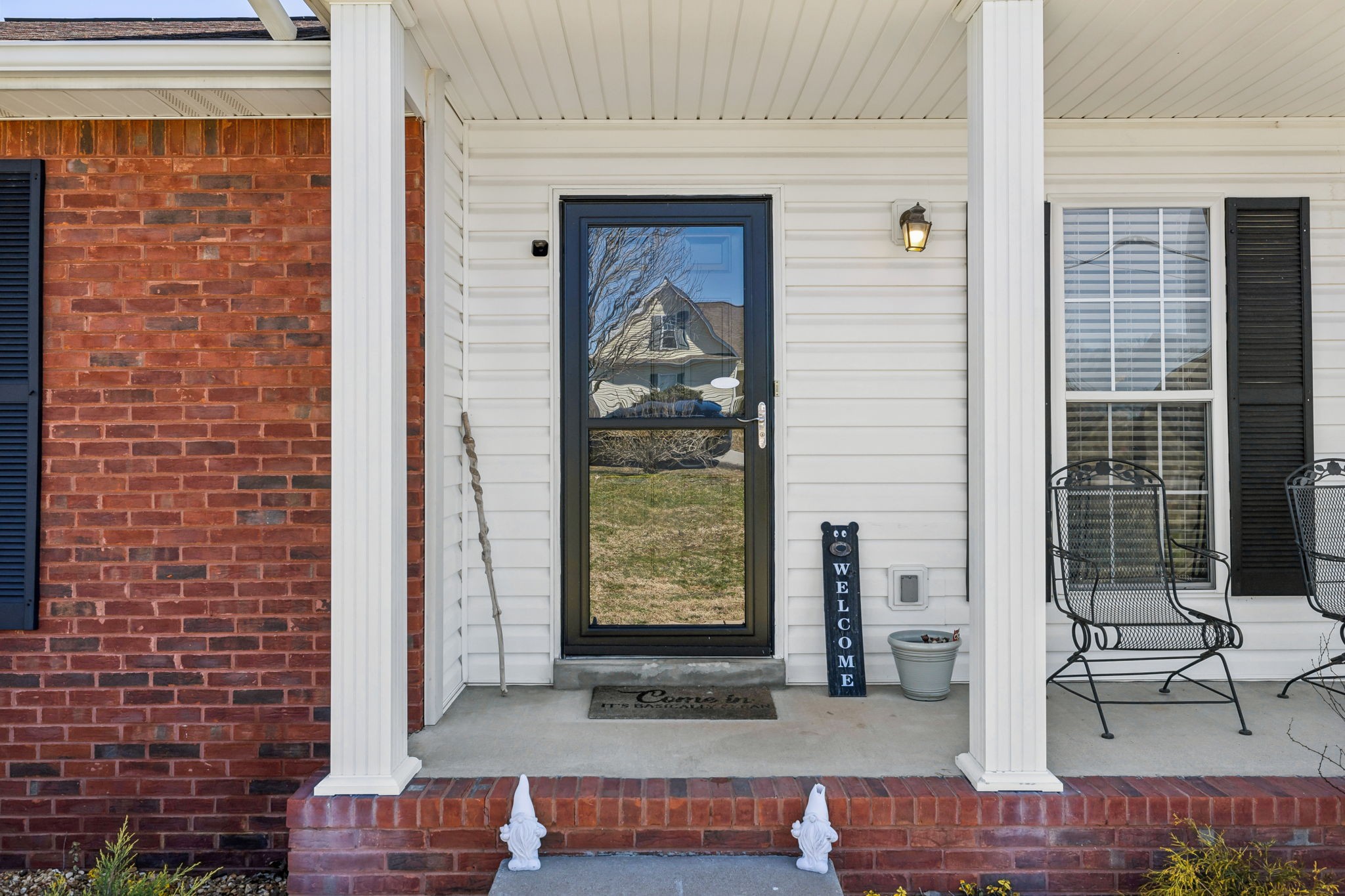 819 Blakemore Road Dickson, TN 37055 - Photo 5 of 54 a view of a door and chair in front of house