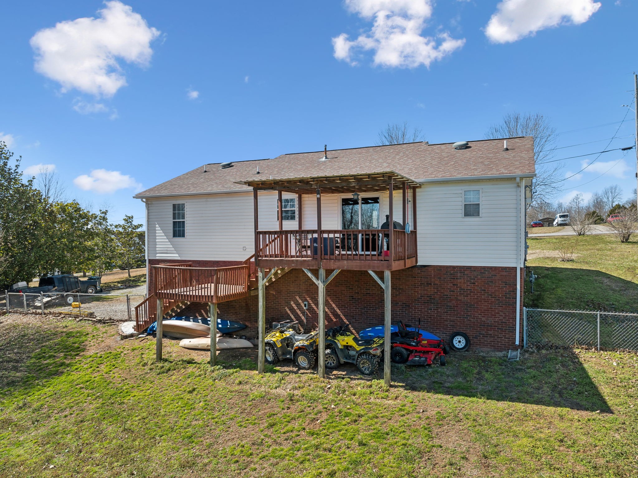 819 Blakemore Road Dickson, TN 37055 - Photo 53 of 54 a view of a house with backyard and a patio